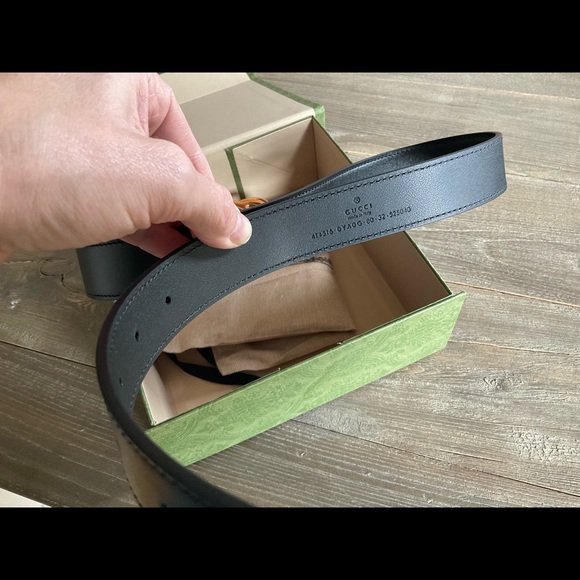 Women’s new in box Gucci belt. Black leather with gold-color double GG buckle. - Picture 9 of 10